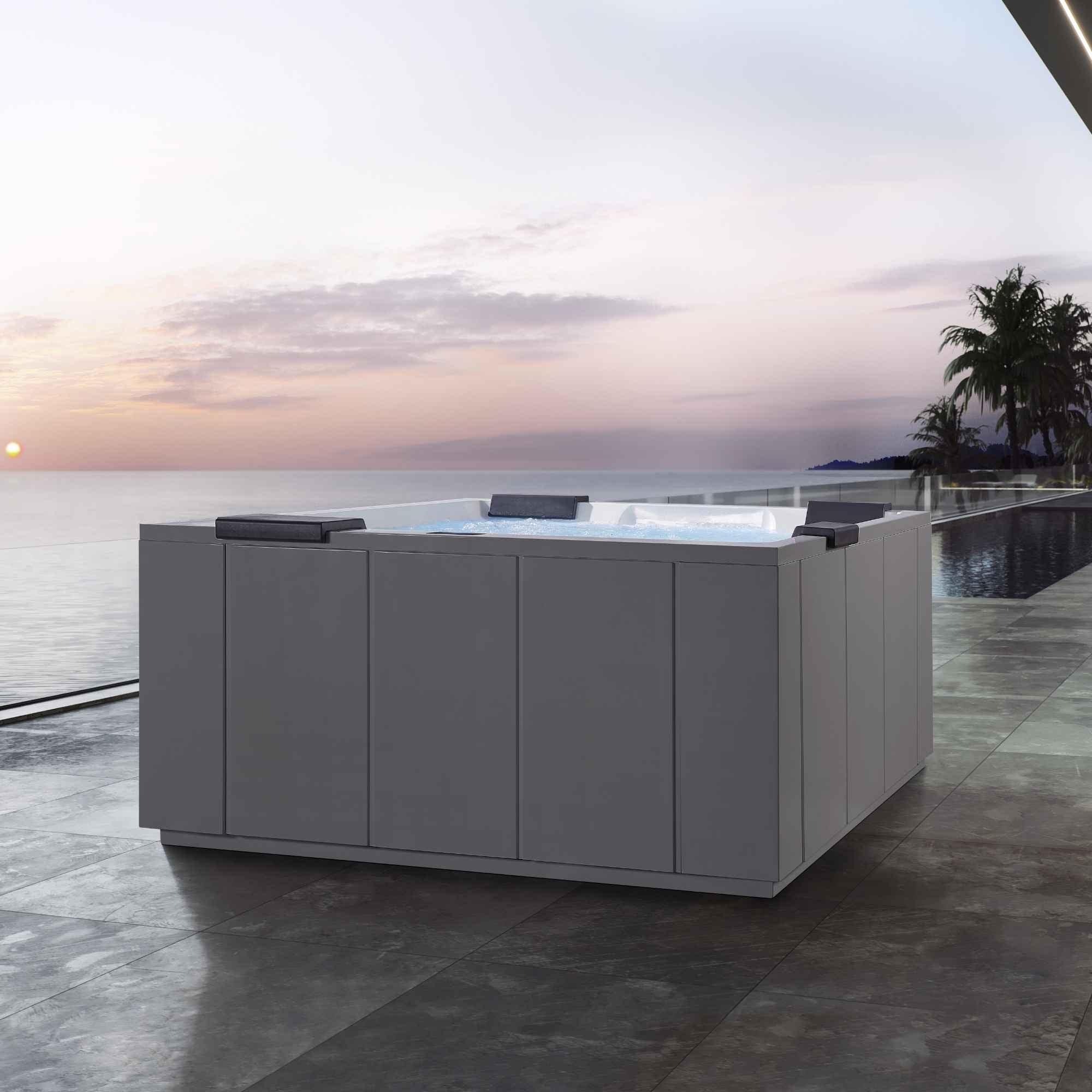 Whirlpool Magnifico von Paolo Ferralli mit Verkleidung in Bianco Lucido auf Sonnenterrasse mit Meerblick